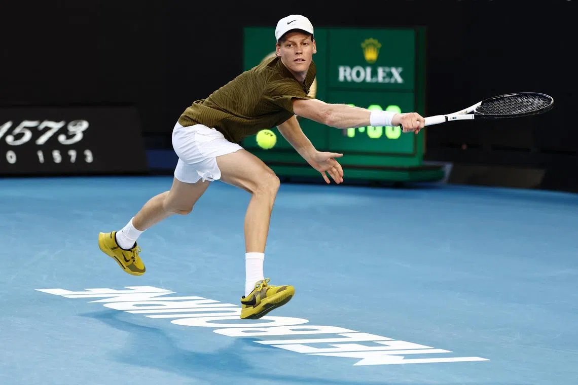 Tennis - Australian Open - Melbourne Park, Melbourne, Australia - January 26, 2026 Italy's Jannik Sinner in action during his fourth round match against Italy's Luciano Darderi REUTERS/Tingshu Wang