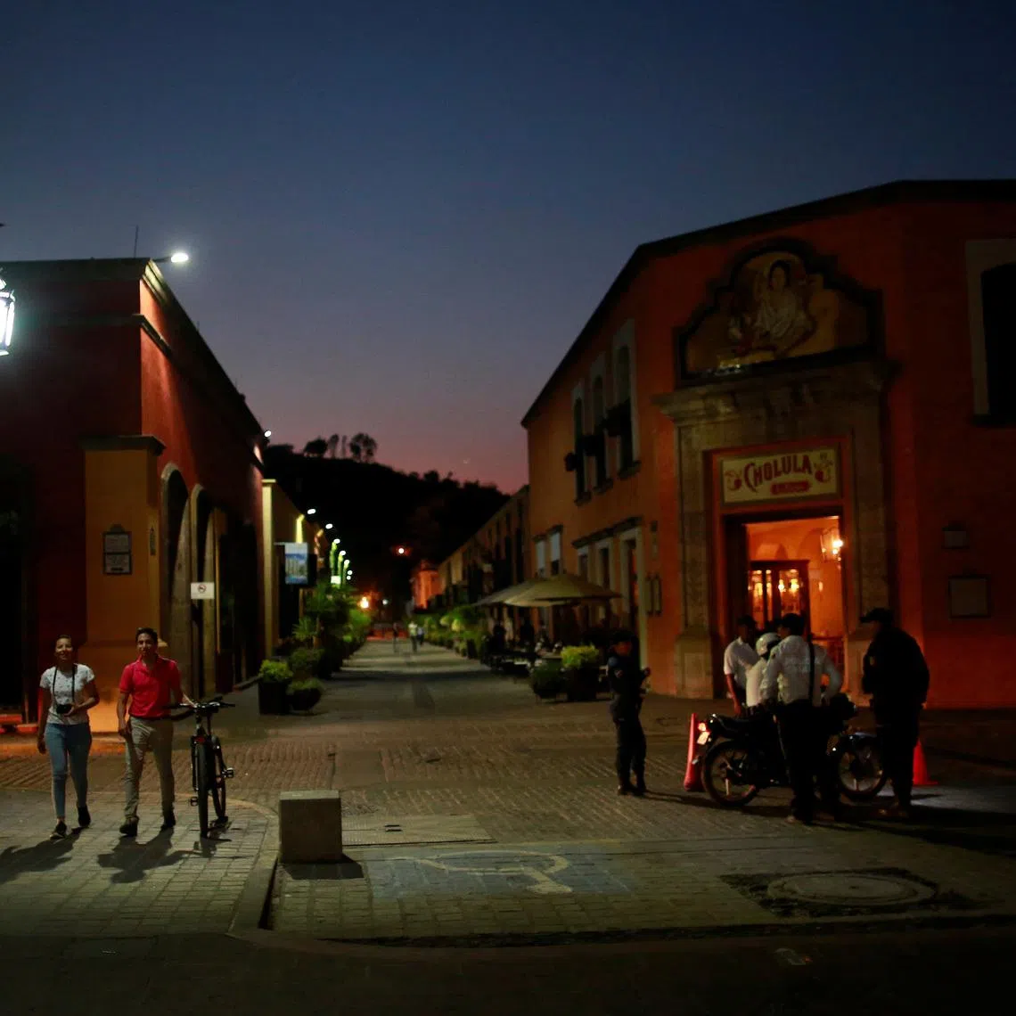 People walk around the town in Tequila, Jalisco, Mexico, April 10, 2018. REUTERS/Carlos Jasso