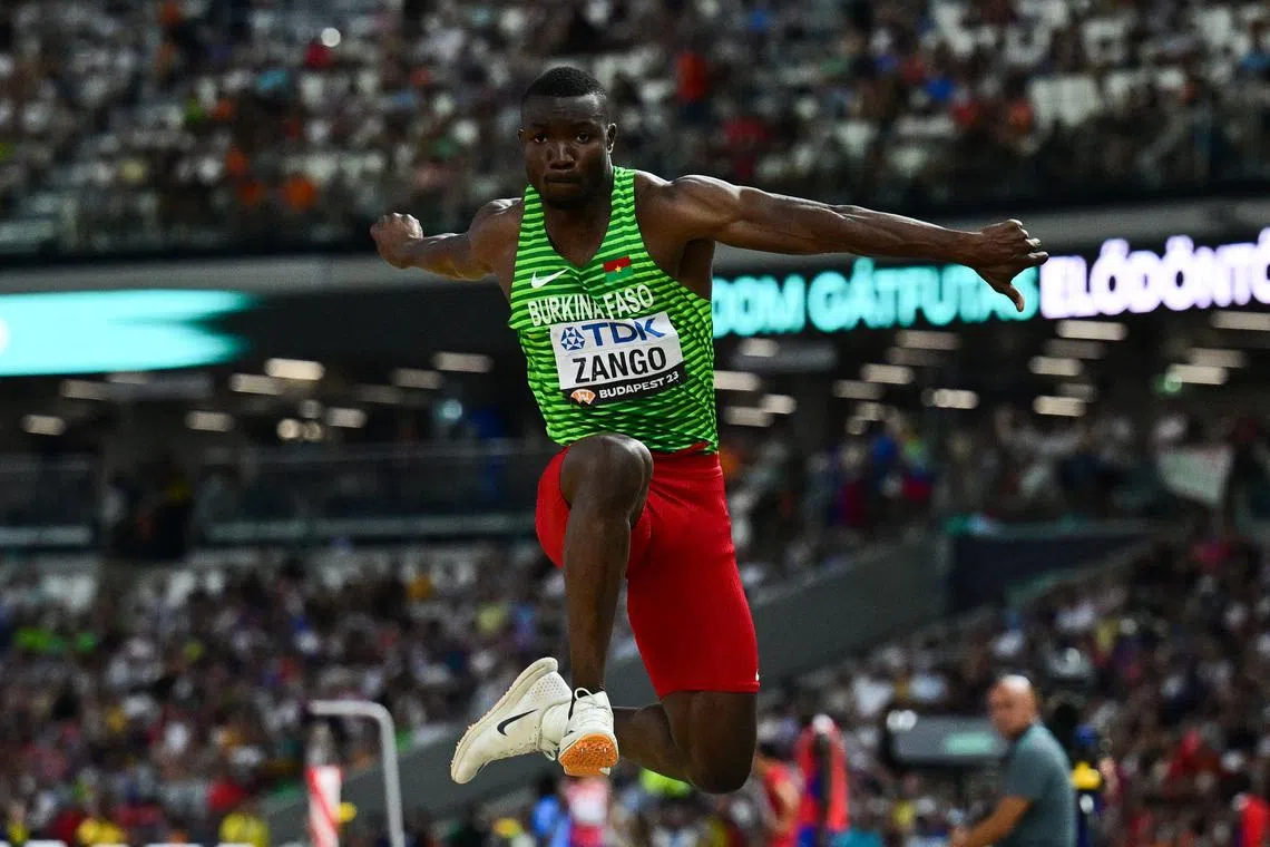 Burkina Faso's Hugues Fabrice Zango competing in the men's triple jump final at the World Athletics Championships.