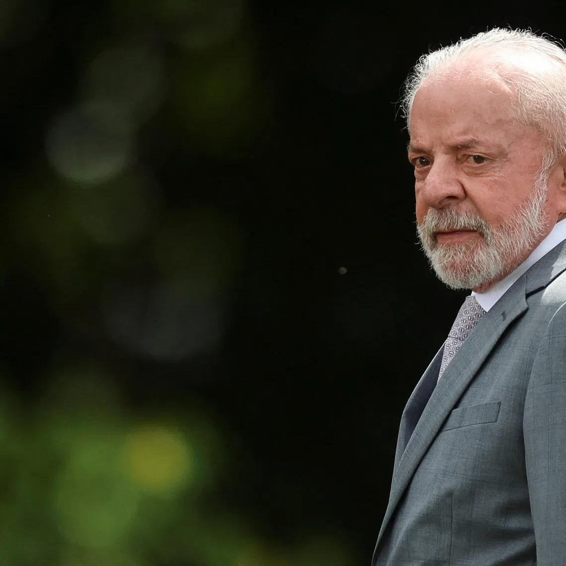 Brazil's President Luiz Inacio Lula da Silva looks on before posing for a family photo with ministers during a ministerial meeting at Granja do Torto official residence, in Brasilia, Brazil, December 17, 2025. REUTERS/Adriano Machado