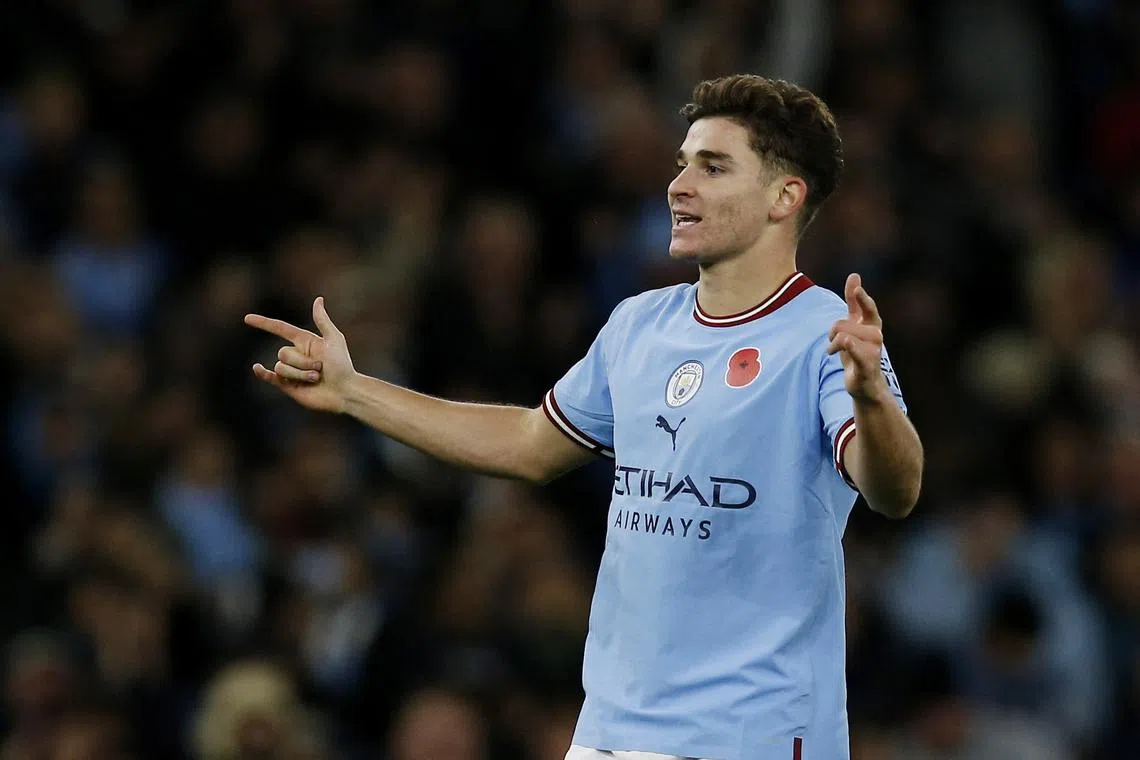 Two goals in five second-half minutes from Riyad Mahrez and Julian Alvarez (above) put Pep Guardiola’s men through to the next round.