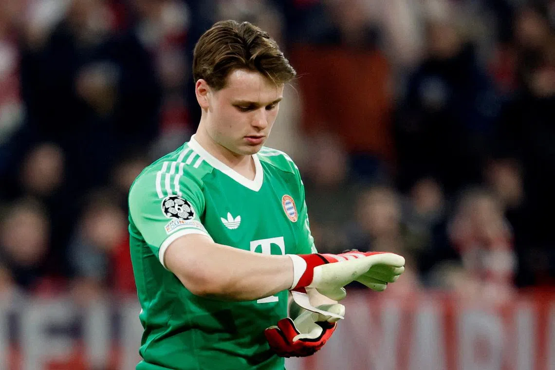 FILE PHOTO: Soccer Football - Champions League - Round of 16 - First Leg - Bayern Munich v Bayer Leverkusen - Allianz Arena, Munich, Germany - March 5, 2025  Bayern Munich's Jonas Urbig REUTERS/Heiko Becker/File Photo