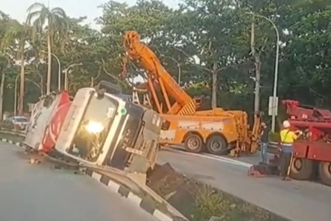 Driver taken to hospital after tipper truck skids into drain along ECP slip road