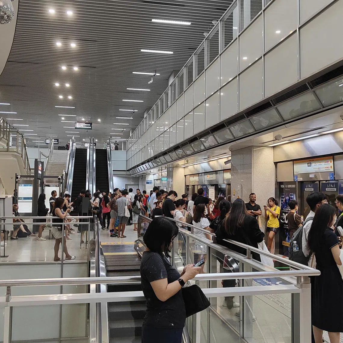 Many commuters were waiting for the shuttle service at Promenade station.
