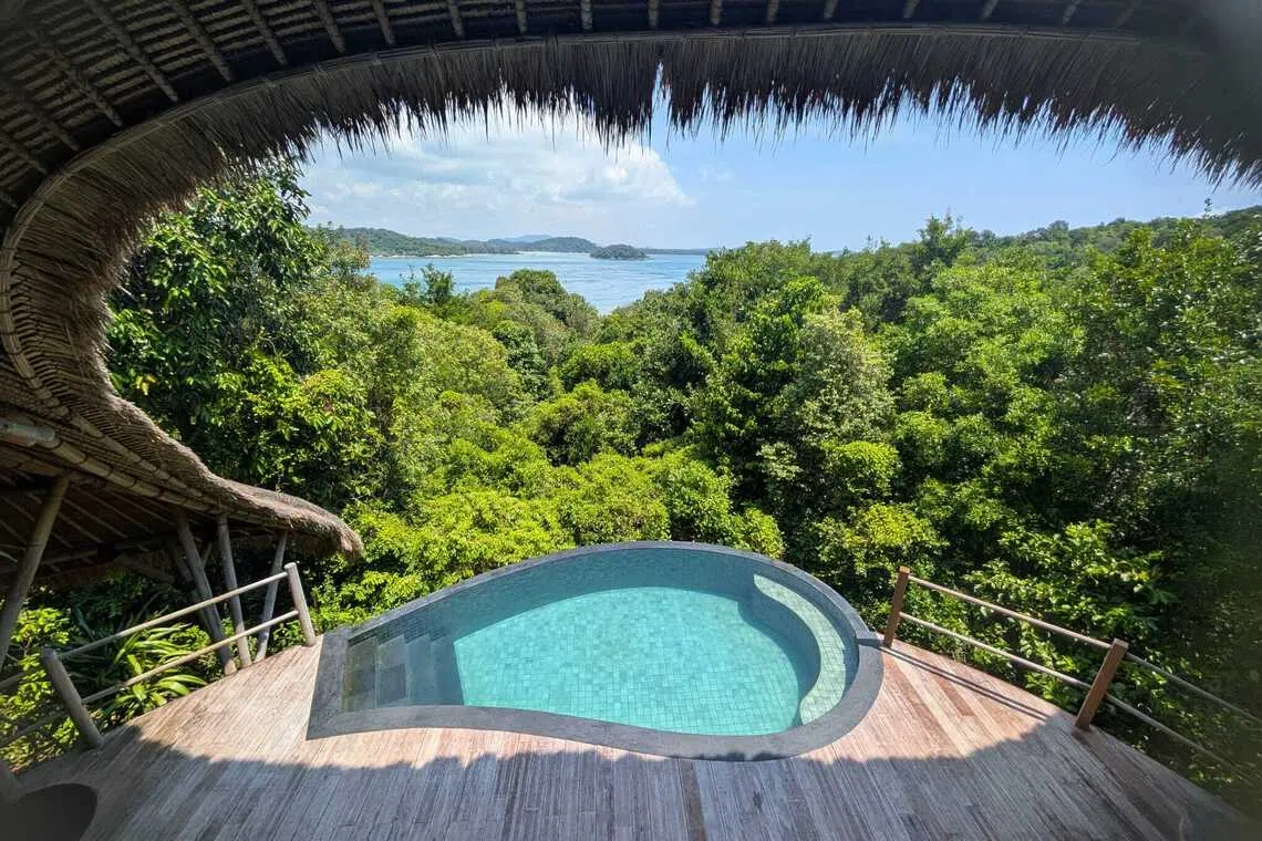 View from the upstairs bedroom of the villa’s private pool and expansive view.