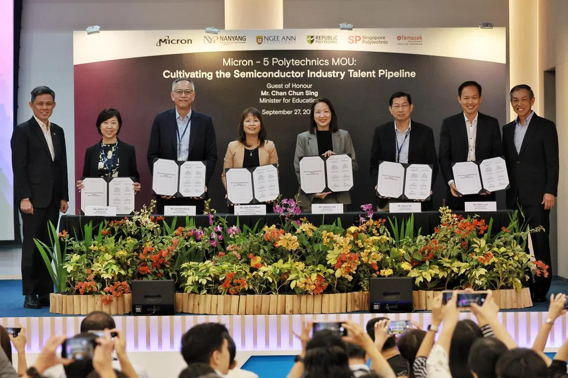 ST20230927_202397877957: Gin Tay/ etmicron27/ Elisha Tushara/

Signing ceremony of Micron -5 Polytechnics MOU: Cultivating the Semiconductor Industry Talent Pipeline by (L-R): Ms. Esther Ho Deputy Principal Nanyang Polytechnic; Mr. Lim Kok Kiang Principal & CEO Ngee Ann Polytechnic; Ms. Sim Cher Whee Vice President Global Talent Acquisition & Mobility Micron Technology; Ms. Jeanne Liew Principal & CEO Republic Polytechnic; Mr. Henry Tan Deputy Principal Singapore Polytechnic; and Mr. Peter Lam
Principal & CEO Temasek Polytechnic; witnessed by Minister for Education, Mr. Chan Chun Sing (far left)and Micron's corporate vice president and Singapore country manager, Mr. Chen Kok Sing (far right).