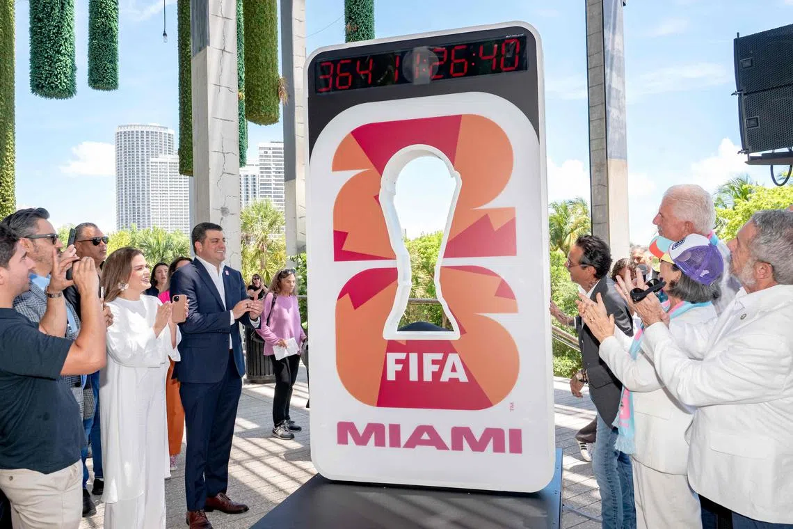 MIAMI, FLORIDA - JUNE 11: Beau Ferrari and Marc Anthony unveil the FIFA World Cup Miami Countdown Clock during the FIFA World Cup One Year Out Celebration at Perez Art Museum Miami on June 11, 2025 in Miami, Florida.   Ivan Apfel/Getty Images/AFP (Photo by Ivan Apfel / GETTY IMAGES NORTH AMERICA / Getty Images via AFP)