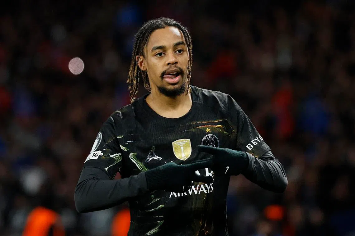 Soccer Football - UEFA Champions League - Round of 16 - First Leg - Paris St Germain v Chelsea - Parc des Princes, Paris, France - March 11, 2026 Paris St Germain's Bradley Barcola celebrates scoring their first goal Action Images via Reuters/Peter Cziborra