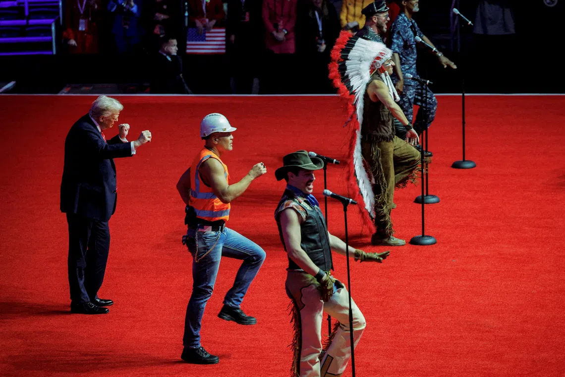 The U.S. President-elect Donald Trump dances onstage as the Village People perform during a rally the day before he is scheduled to be inaugurated for a second term, in Washington, U.S., January 19, 2025. REUTERS/Brian Snyder