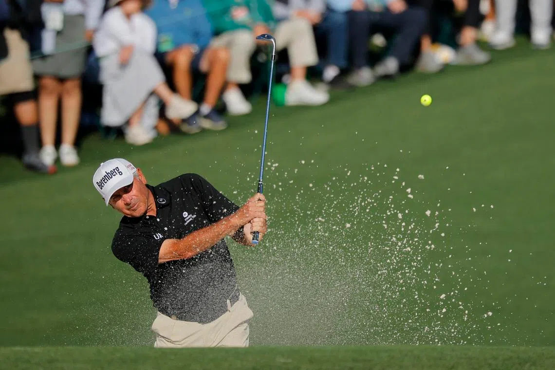 Golf - The Masters - Augusta National Golf Club, Augusta, Georgia, U.S. - April 10, 2026  Fred Couples of the U.S. plays out from the bunker on the 2nd hole during the second round REUTERS/Mike Blake