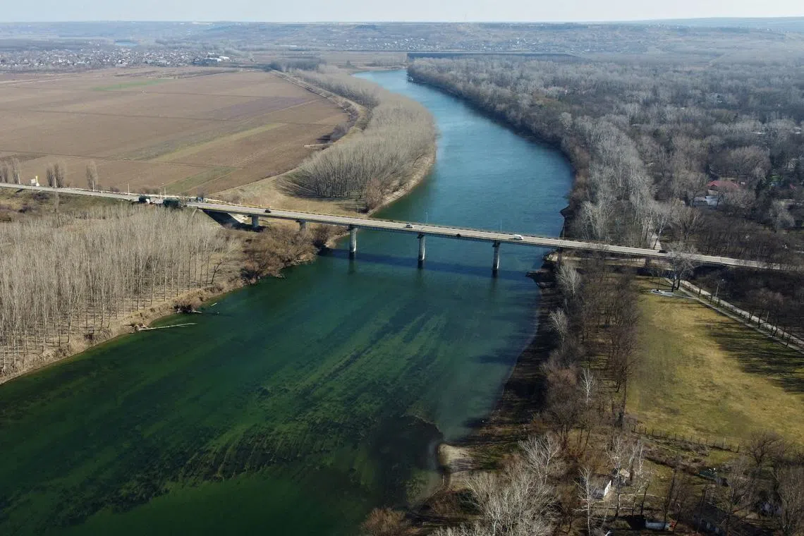 FILE PHOTO: An aerial view shows the bridge over the Dniester River leading to the breakaway region of Transdniestria, near the town of Vadul lui Voda, Moldova March 1, 2023. REUTERS/Fedja Grulovic/File Photo