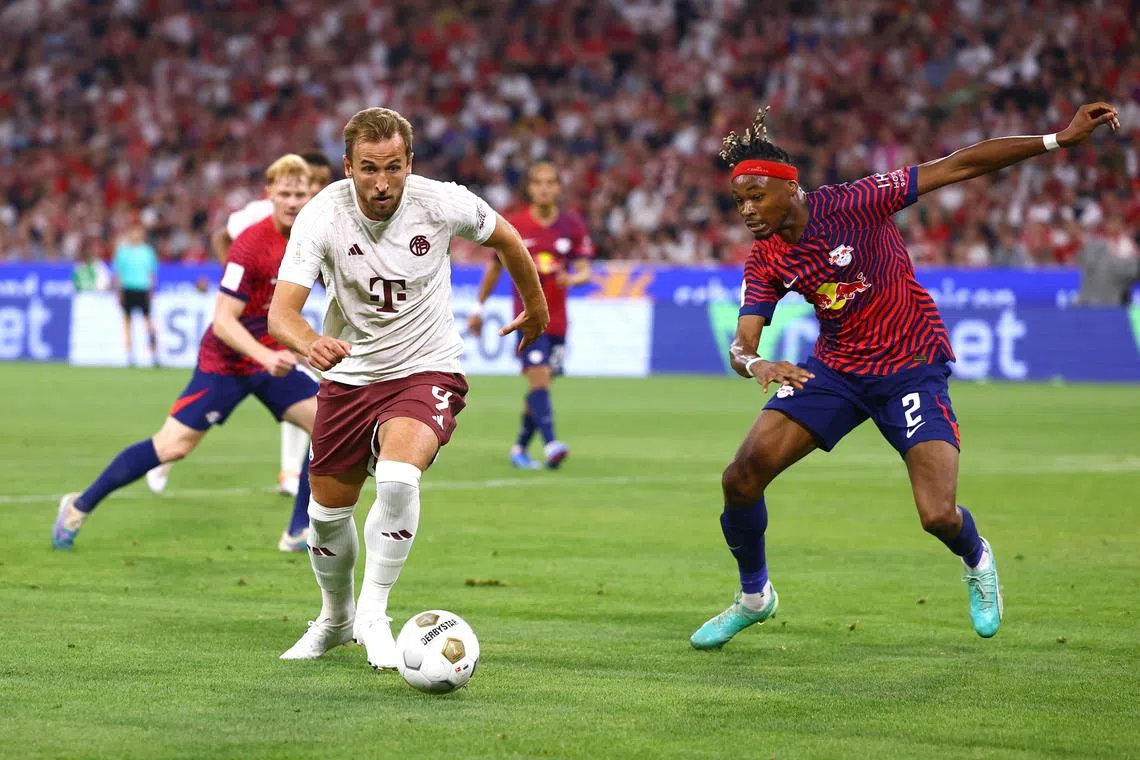 Bayern Munich's Harry Kane in action with RB Leipzig's Mohamed Simakan in their German Super Cup clash on Saturday. 