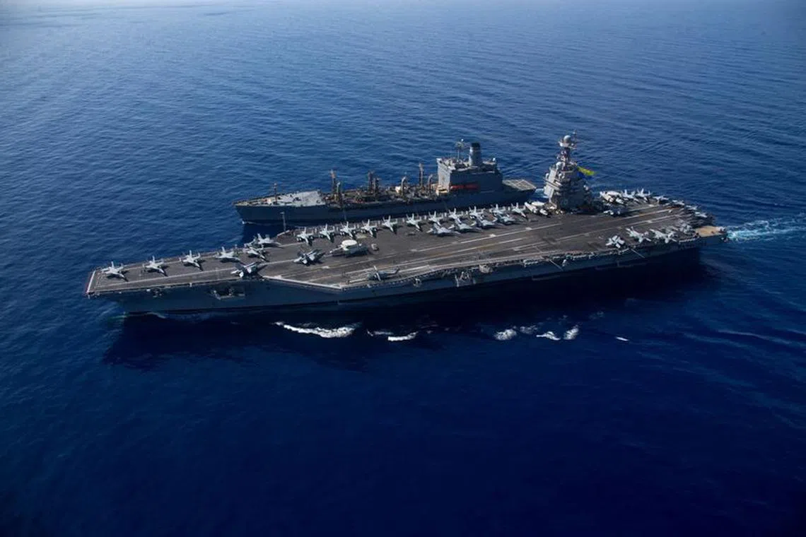 The world?s largest aircraft carrier USS Gerald R. Ford steams alongside USNS Laramie (T-AO-203) during a fueling-at-sea in the eastern Mediterranean Sea, as a scheduled deployment in the U.S Naval Forces Europe area of operations, deployed by U.S. Sixth Fleet to defend U.S, allied, and partners interests, in this photo taken on October, 11, 2023 and released by U.S. Navy on October 14, 2023. U.S Naval Forces Central Command / U.S. 6th Fleet / Handout via REUTERS