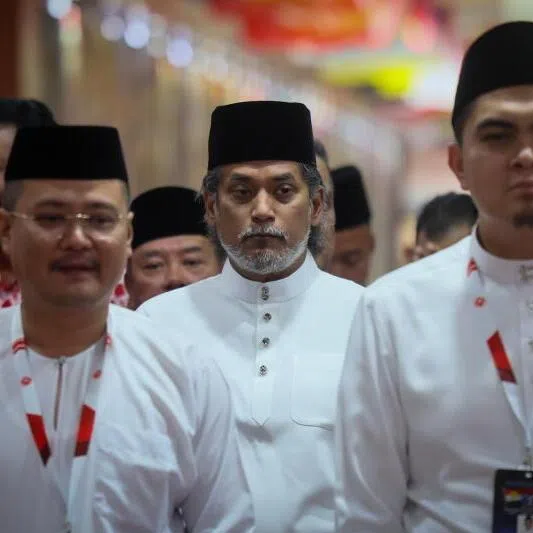 Umno's Rumah Bangsa initiative involves the return of people like Khairy Jamaluddin (second from right), seen here at party's general assembly in January, along with current Youth chief Akmal Saleh (right). 