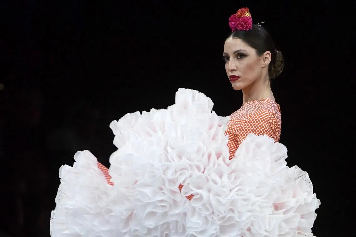 A model presents a creation by Visconsin during the Simof 2023 (International Flamenco Fashion Show) in Sevilla on Jan 29, 2023. 