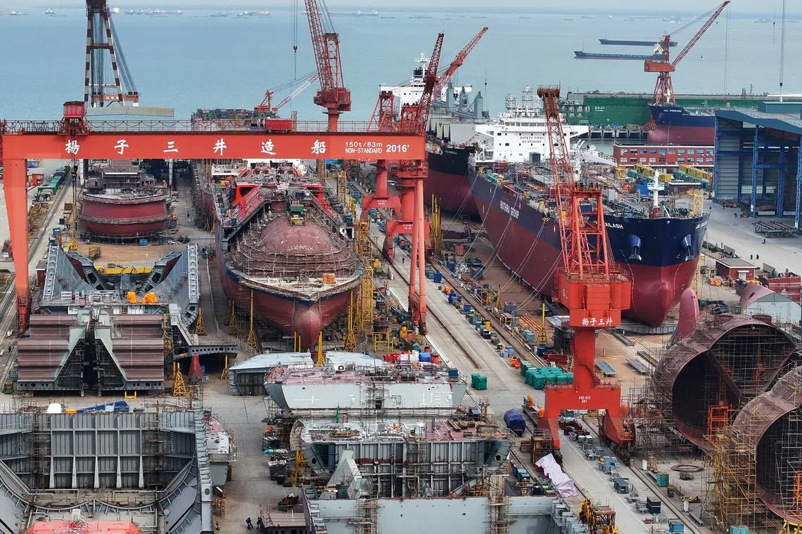 Ships under construction in a yard of a shipbuilding company in China's Jiangsu province on Jan 16, 2025.