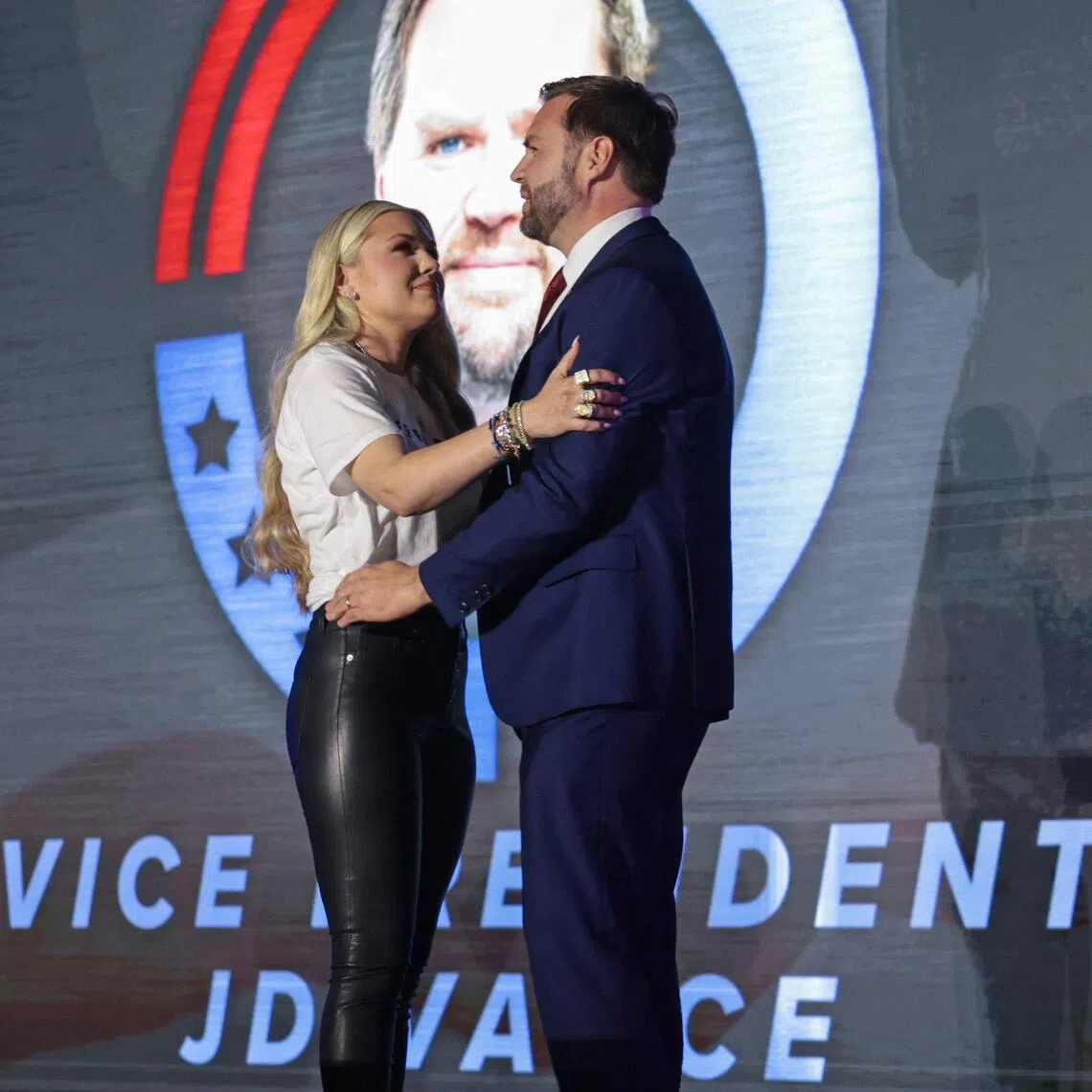 Mrs Erika Kirk - the widow of slain right-wing activist Charlie Kirk - welcoming US Vice-President J.D. Vance onstage at an event for Turning Point USA, a youth organisation founded by her husband.