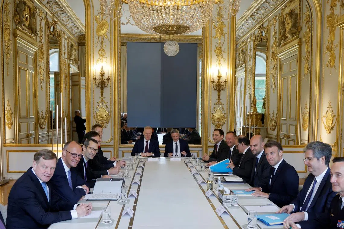 France's President Emmanuel Macron meets with Germany's newly elected Chancellor Friedrich Merz at the Elysee presidential palace in Paris, France on May 7, 2025. LUDOVIC MARIN/Pool via REUTERS