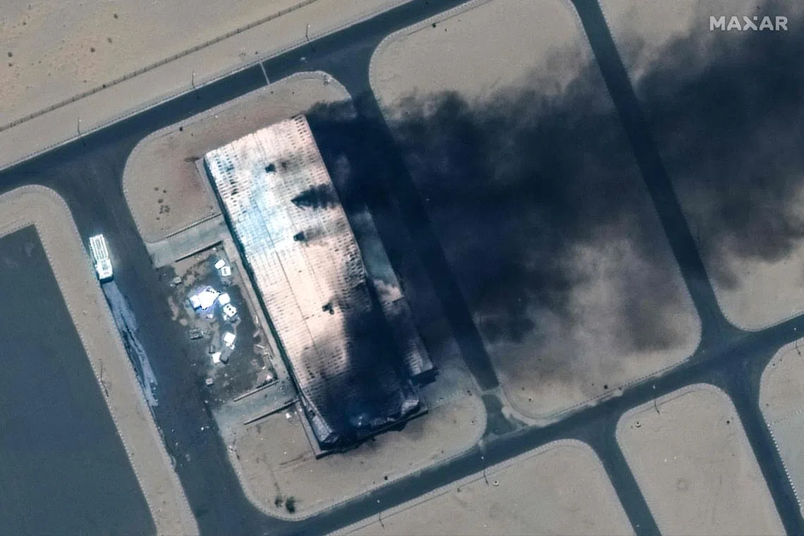 A burning building at the Merowe Airport in Sudan.