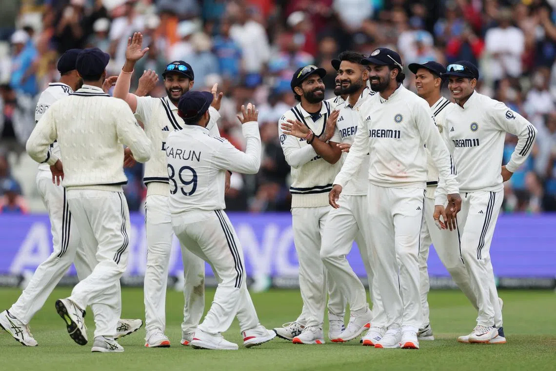 FILE PHOTO: Cricket - Second Test - England v India - Edgbaston Cricket Ground, Birmingham, Britain - July 6, 2025 India's Akash Deep celebrates with teammates after taking the wicket of England's Jamie Smith Action Images via Reuters/Paul Childs/File Photo