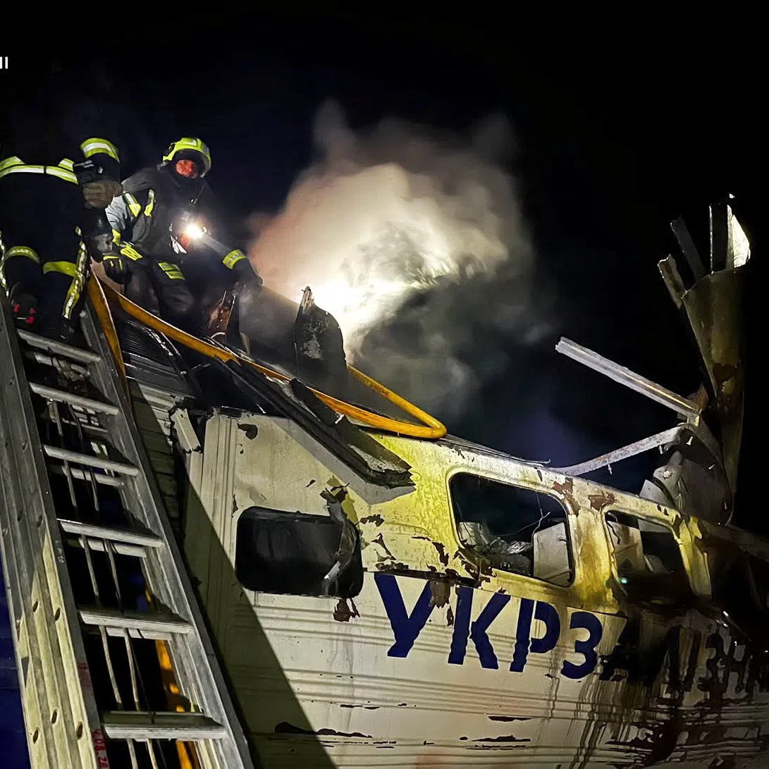 Firefighters work at the site of a passenger train locomotive hit by a Russian drone strike, amid Russia's attack on Ukraine, in the Volyn region, Ukraine, in this handout picture released September 15, 2026. Press service of the State Emergency Service of Ukraine in Volyn region/Handout via REUTERS
