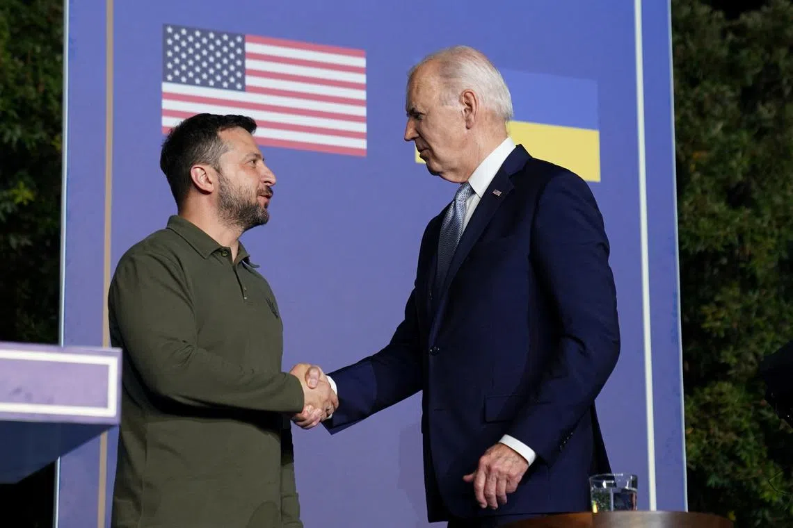 Joe Biden and Volodymyr Zelenskiy, Fasano, Italy, June 13, 2024. REUTERS/Kevin Lamarque