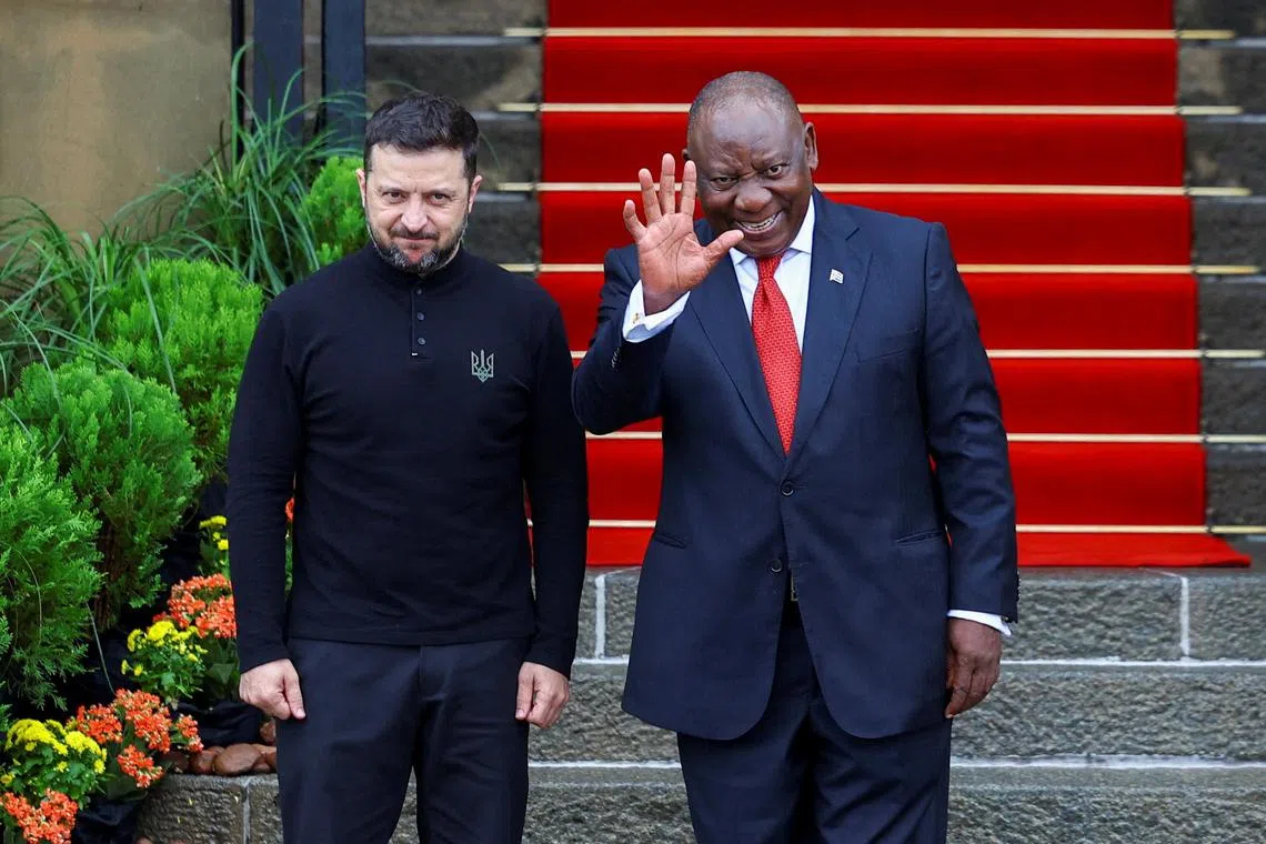 Ukrainian President Volodymyr Zelensky (left) is welcomed to Pretoria by South African President Cyril Ramaphosa, on April 24.