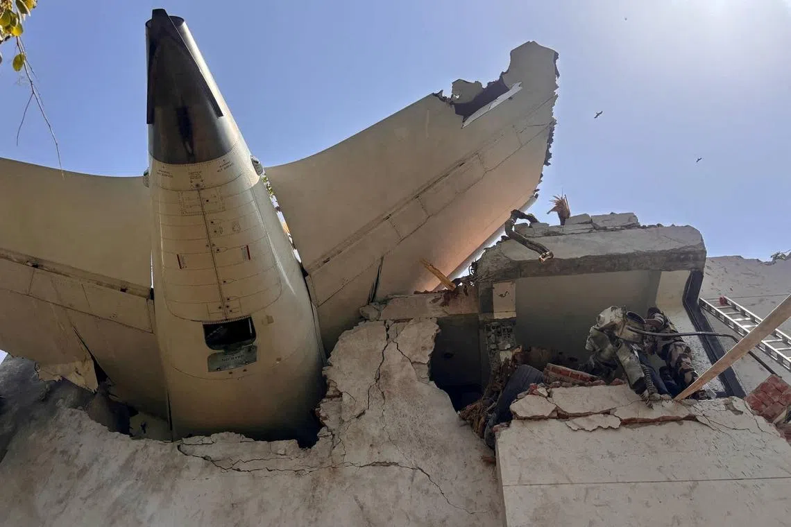 The rear of an Air India Boeing 787 Dreamliner plane following its crash, in Ahmedabad, India, on June 12, 2025. C