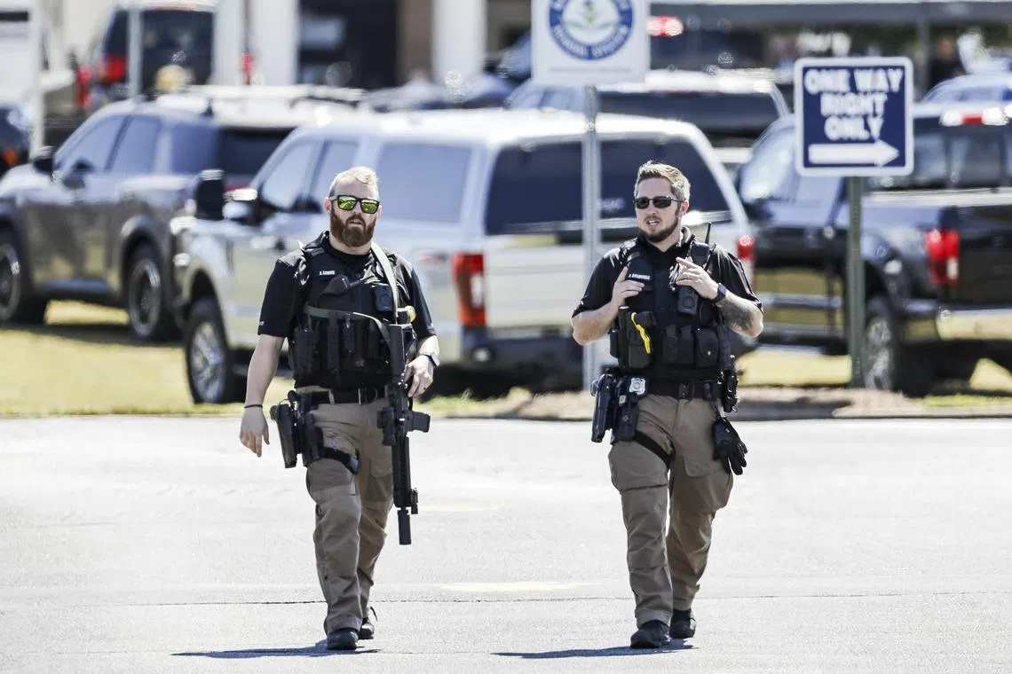 Police officers on the scene of a shooting at Apalachee High School in Winder, Georgia, on Sept 4.