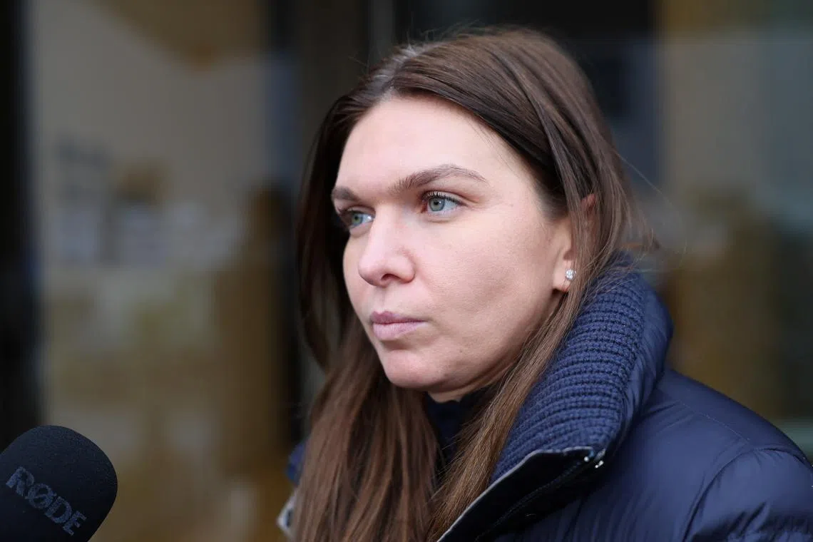 FILE PHOTO: Tennis player Simona Halep of Romania speaks to the media, on the hearing day of a doping case against her at the Court of Arbitration for Sport (CAS) in Lausanne, Switzerland February 9, 2024. REUTERS/Denis Balibouse/File Photo