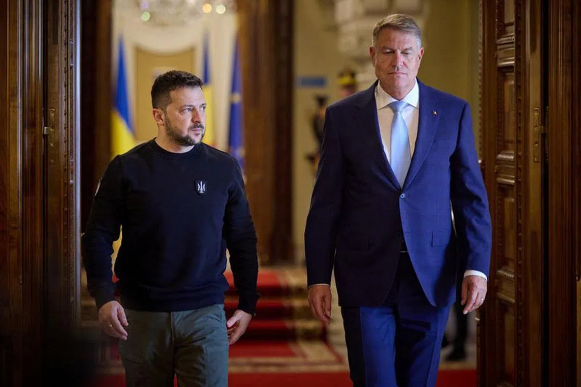 Ukraine's President Volodymyr Zelenskiy meets with Romania's President Klaus Werner Iohannis in Bucharest, Romania, October 10, 2023. Ukrainian Presidential Press Service/Handout via REUTERS ATTENTION EDITORS - THIS IMAGE HAS BEEN SUPPLIED BY A THIRD PARTY.