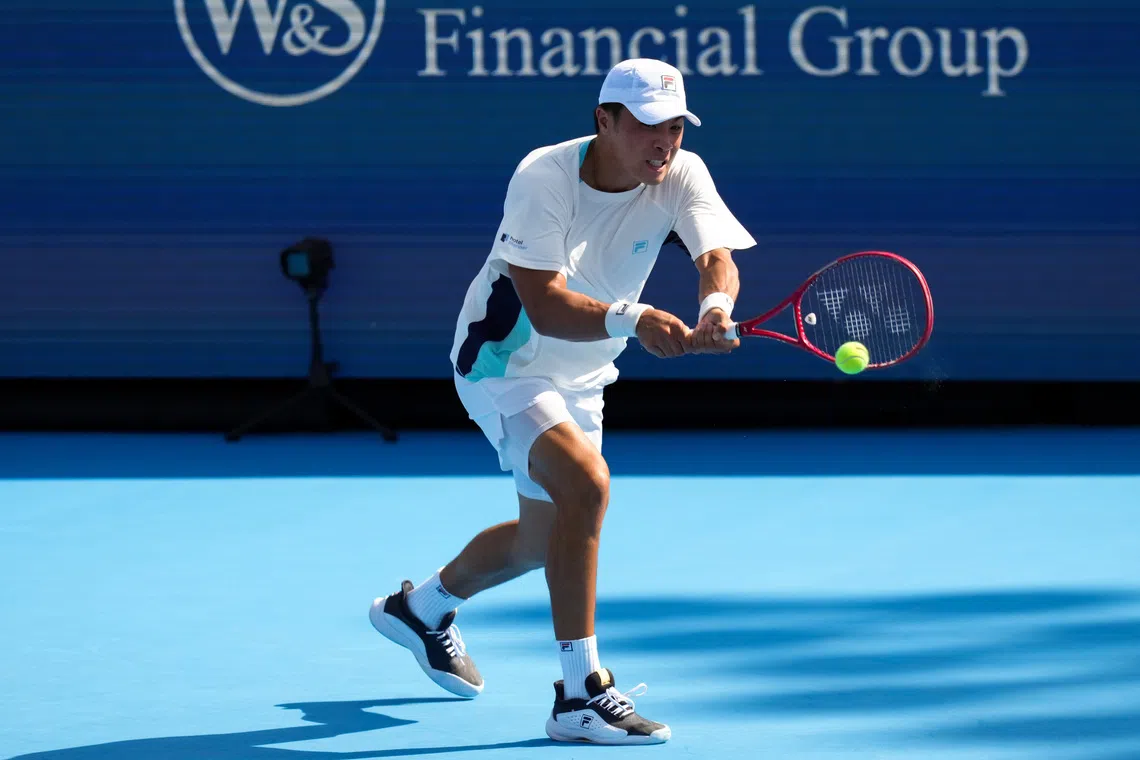 Aug 18, 2026; Mason, OH, USA;  Brandon Nakashima (USA) returns a shot against Daniil Medvedev during the Cincinnati Open at Lindner Family Tennis Center. Mandatory Credit: Aaron Doster-Imagn Images