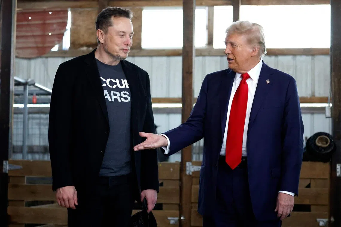 US President-elect Donald Trump (right) has tasked billionaire Elon Musk (left) and former Republican presidential candidate Vivek Ramaswamy with leading a panel to streamline US bureaucracy.
