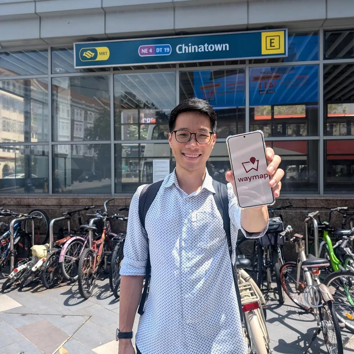 jowaymap - Mr Anselm De Mello, Waymap's head of Southeast Asia, demonstrating the app outside Chinatown MRT station.
Credit: Waymap