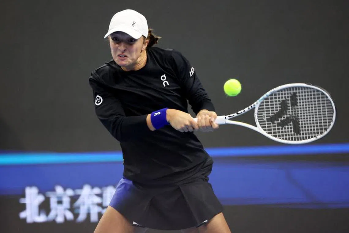 FILE PHOTO: Tennis - China Open - National Tennis Center, Beijing, China - October 8, 2023 Poland's Iga Swiatek in action during her Women's Singles final match against Russia's Liudmila Samsonova REUTERS/Florence Lo/File Photo