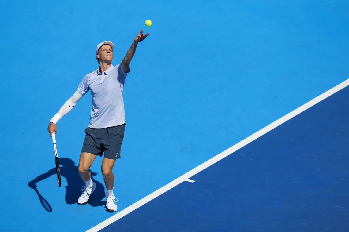 Aug 18, 2025; Cincinnati, OH, USA;  Jannik Sinner (ITA) serves against Carlos Alcaraz (ESP) during the Cincinnati Open at the Lindner Family Tennis Center. Mandatory Credit: Aaron Doster-Imagn Images