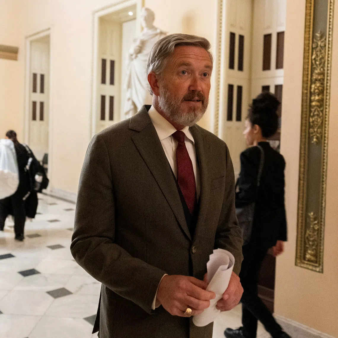 U.S. Representative Thomas Massie speaks with a reporter after introducing a resolution to impeach Defense Secretary Pete Hegseth in connection with the US conflict with Iran, on the floor of the House of Representatives on Capitol Hill in Washington, on Sept 15, 2026.