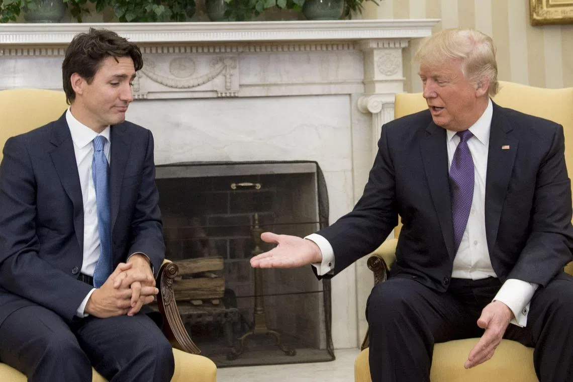 A 2007 photo of Canadian Prime Minister Justin Trudeau with then US President Donald Trump.