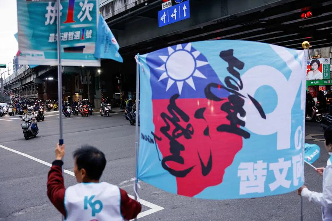 People on motorbikes ride during morning rush hour in Taipei, Taiwan January 10, 2024. REUTERS/Ann Wang
