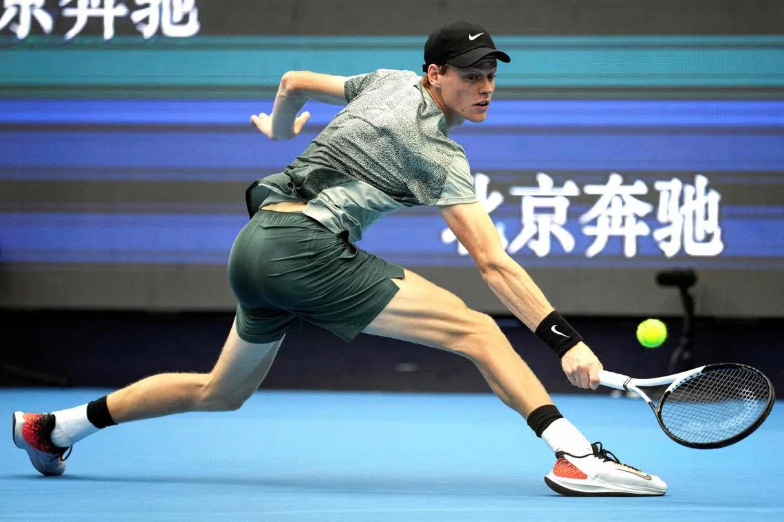 Italy’s Jannik Sinner hitting a return against Chile’s Nicolas Jarry during their men’s singles round of 32 match at the China Open tournament in Beijing on Sept 26. World No. 1 Sinner prevailed 4-6, 6-3, 6-1.