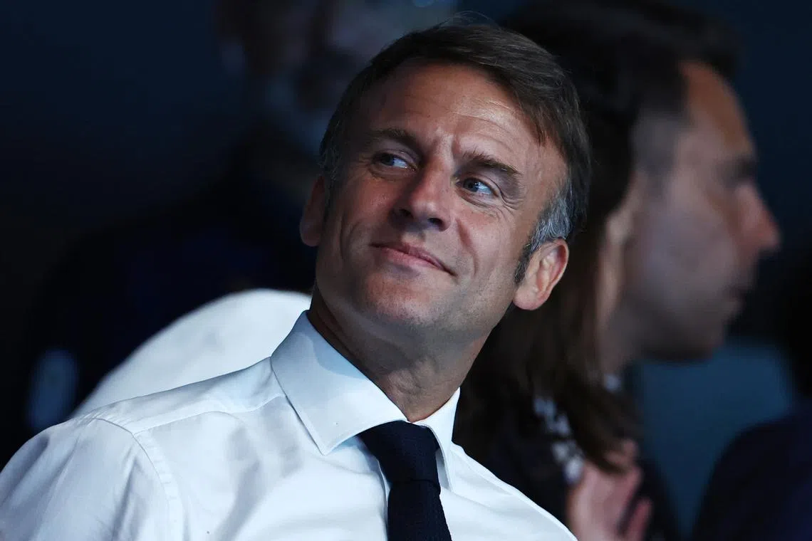 Paris 2024 Olympics - Swimming - Men's 50m Freestyle Final - Paris La Defense Arena, Nanterre, France - August 02, 2024. France's Presiden Emmanual Macron attends the event. REUTERS/Evgenia Novozhenina