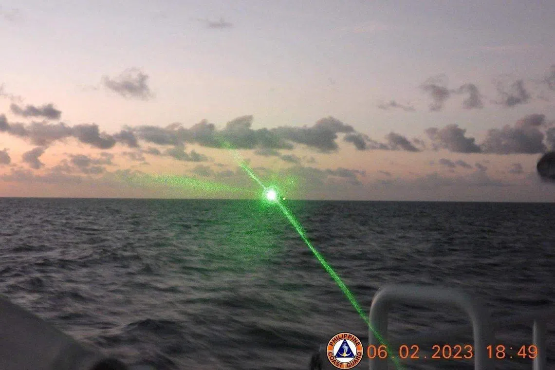 China Coast Guard Vessel No. 5205 is shown directing a laser beam at BRP Malapascua in this photo taken on Feb 6, 2023. 