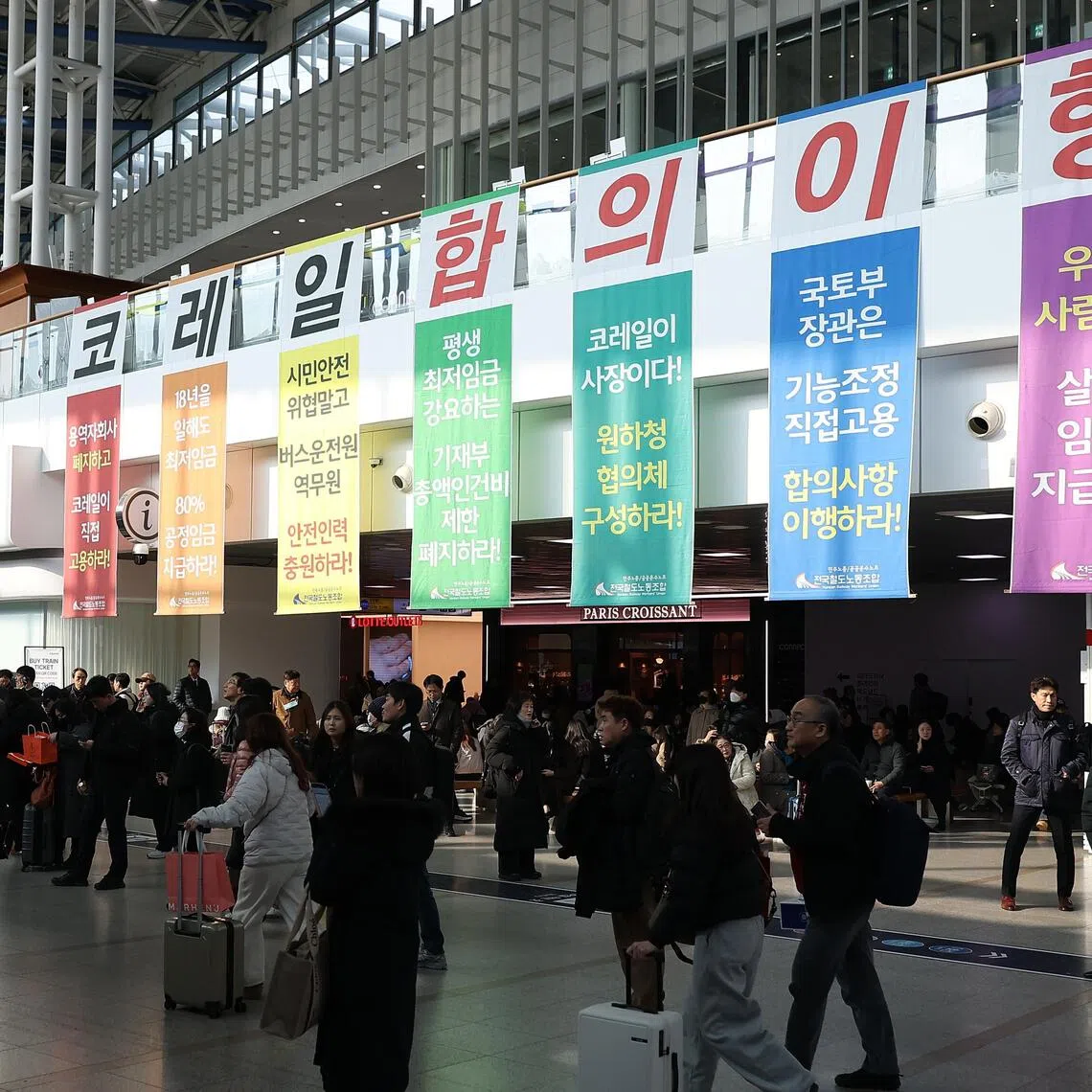 Banners bearing protest messages from unionised rail workers are hung inside Seoul Station on Dec 10. The union had initially planned to launch the strike on Dec 11.