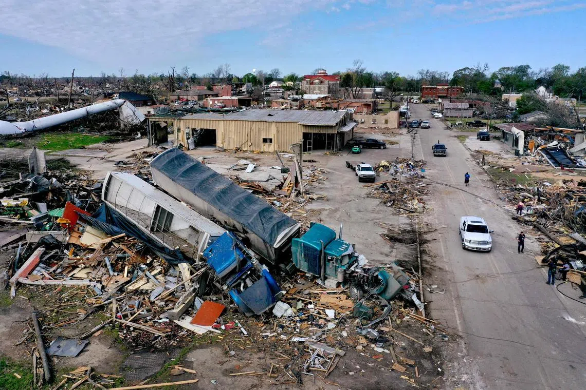 Piles of debris remain where homes once stood before Friday's EF-4 tornado on March 26, in Rolling Fork, Mississippi. 