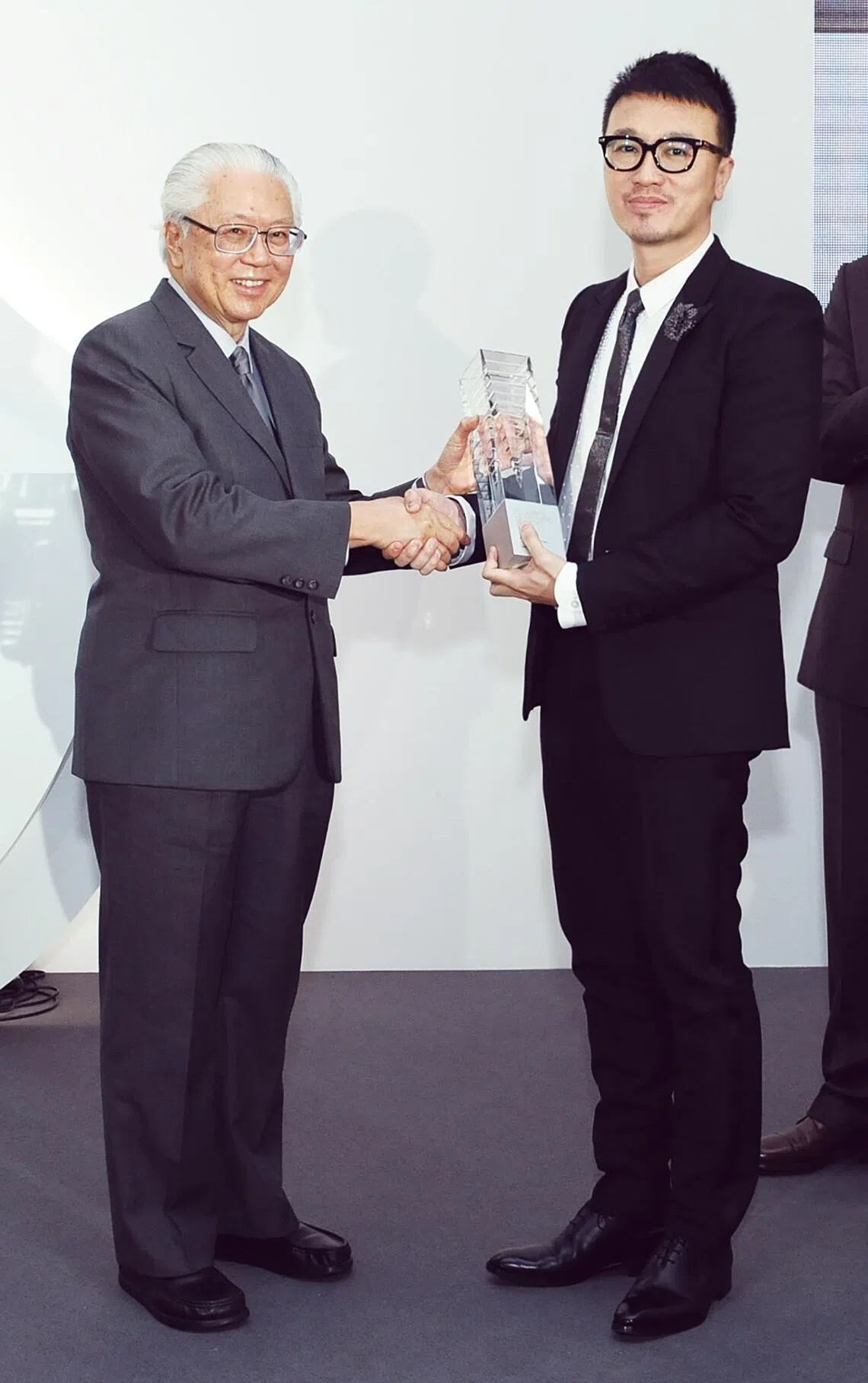 Larry Peh receiving the President’s Design Award’s Designer of the Year in 2014 from former president Tony Tan.