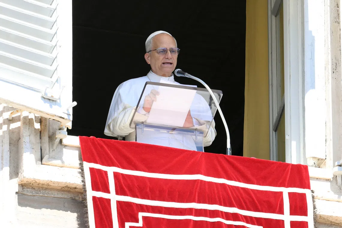 Pope Leo XIV speaks as he appears to lead the weekly Angelus prayer, at the Vatican, September 21, 2025.   Vatican Media/Mario Tomassetti/Handout via REUTERS