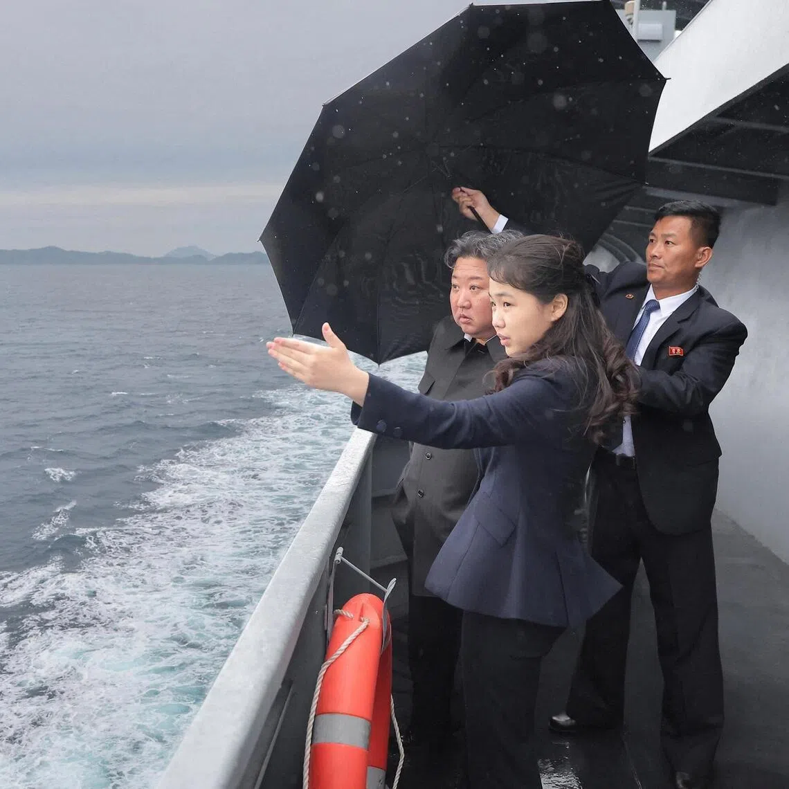 North Korean leader Kim Jong Un and his daughter Kim Ju Ae on the naval vessel Kang Kon to supervise its navigation test in this photo released by the Korean Central News Agency on June 6, 2026.   