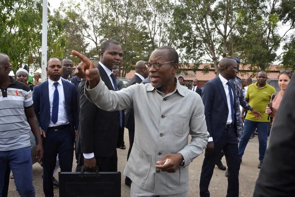 FILE PHOTO: Benin president Patrice Talon gestures after casting his ballot during the parliamentary election at his polling center in Cotonou, Benin, January 8, 2023. REUTERS/Charles Placide Tossou/File Photo