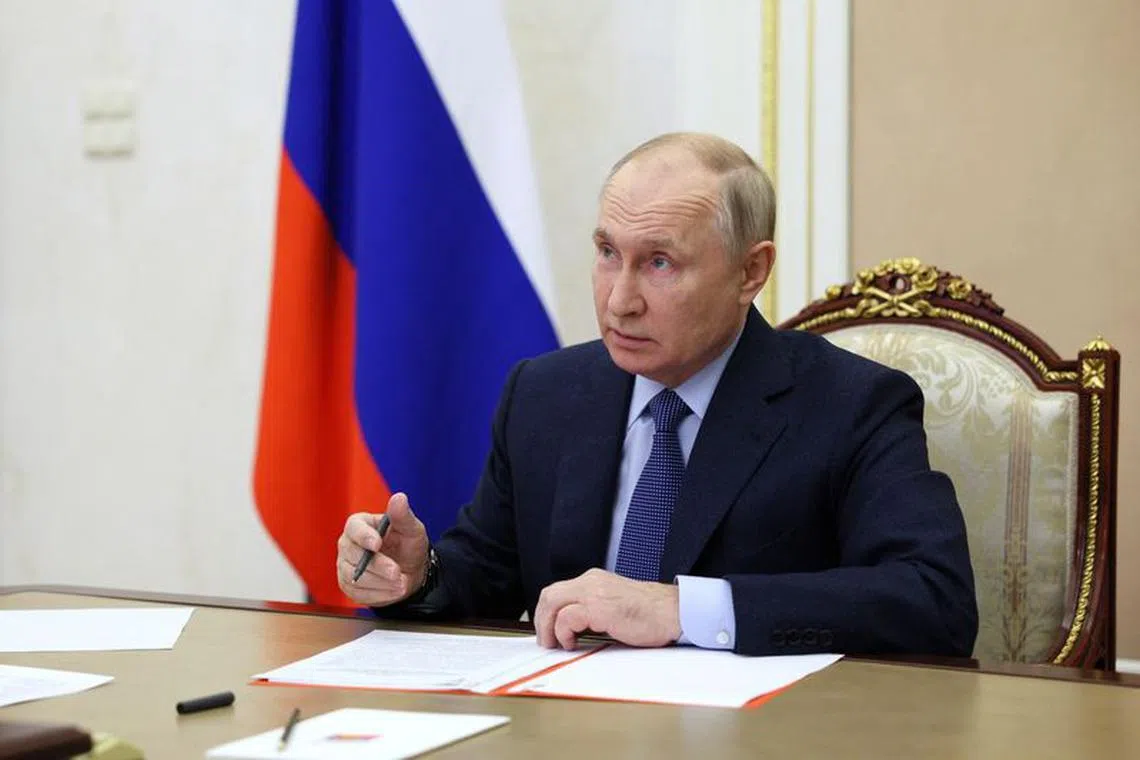 Russian President Vladimir Putin chairs a meeting with members of the Security Council via video link at the Kremlin in Moscow, Russia October 27, 2023. Sputnik/Gavriil Grigorov/Pool via REUTERS/File Photo
