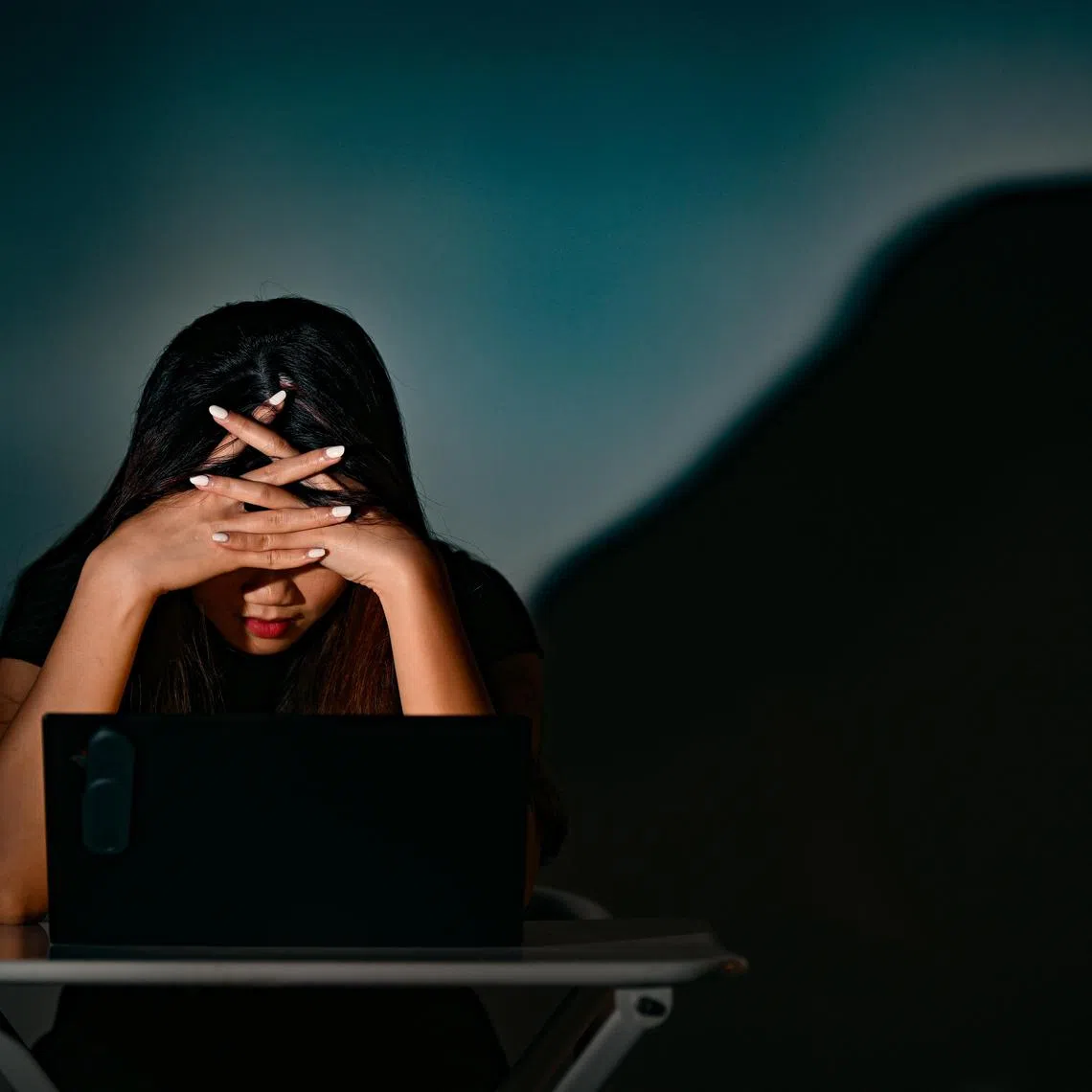 Photo illustration of a person having stress at work or studies.